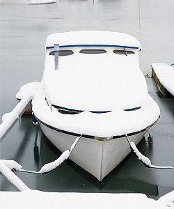 Boat covered in snow
