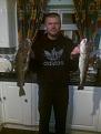 Click image for larger version

Name:	chris with 2 of his fish.jpg
Views:	291
Size:	88.4 KB
ID:	1526171